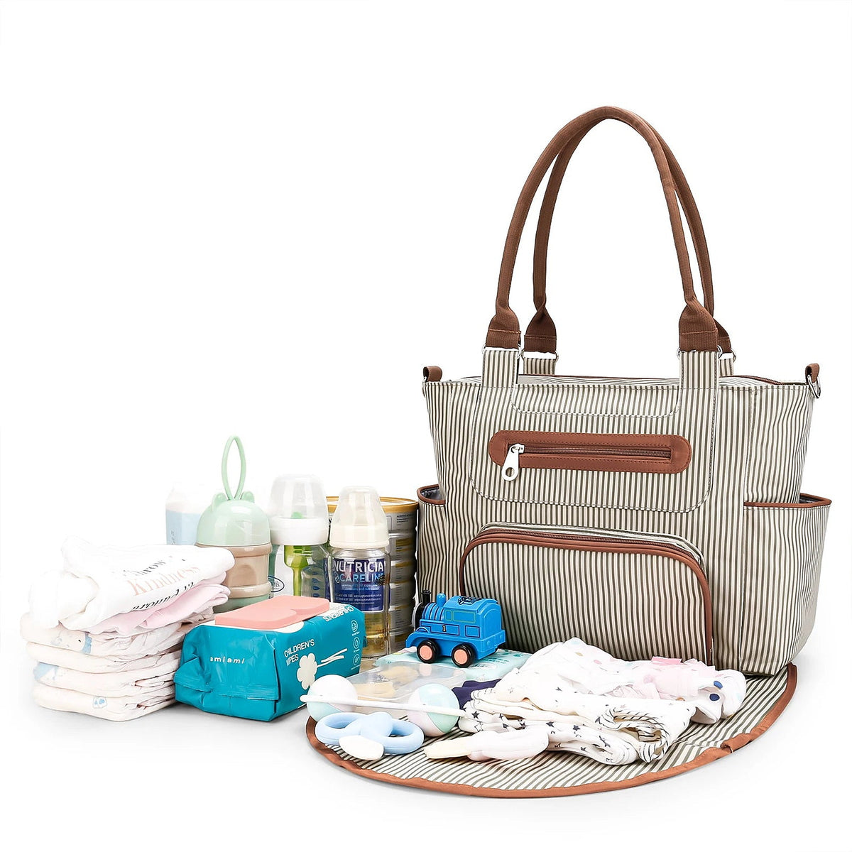 The 7-piece nappy bag set shown with nappies, wipes, bottles, formula and a changing mat