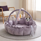Lavender baby play gym nest with bunny and panda hanging toys